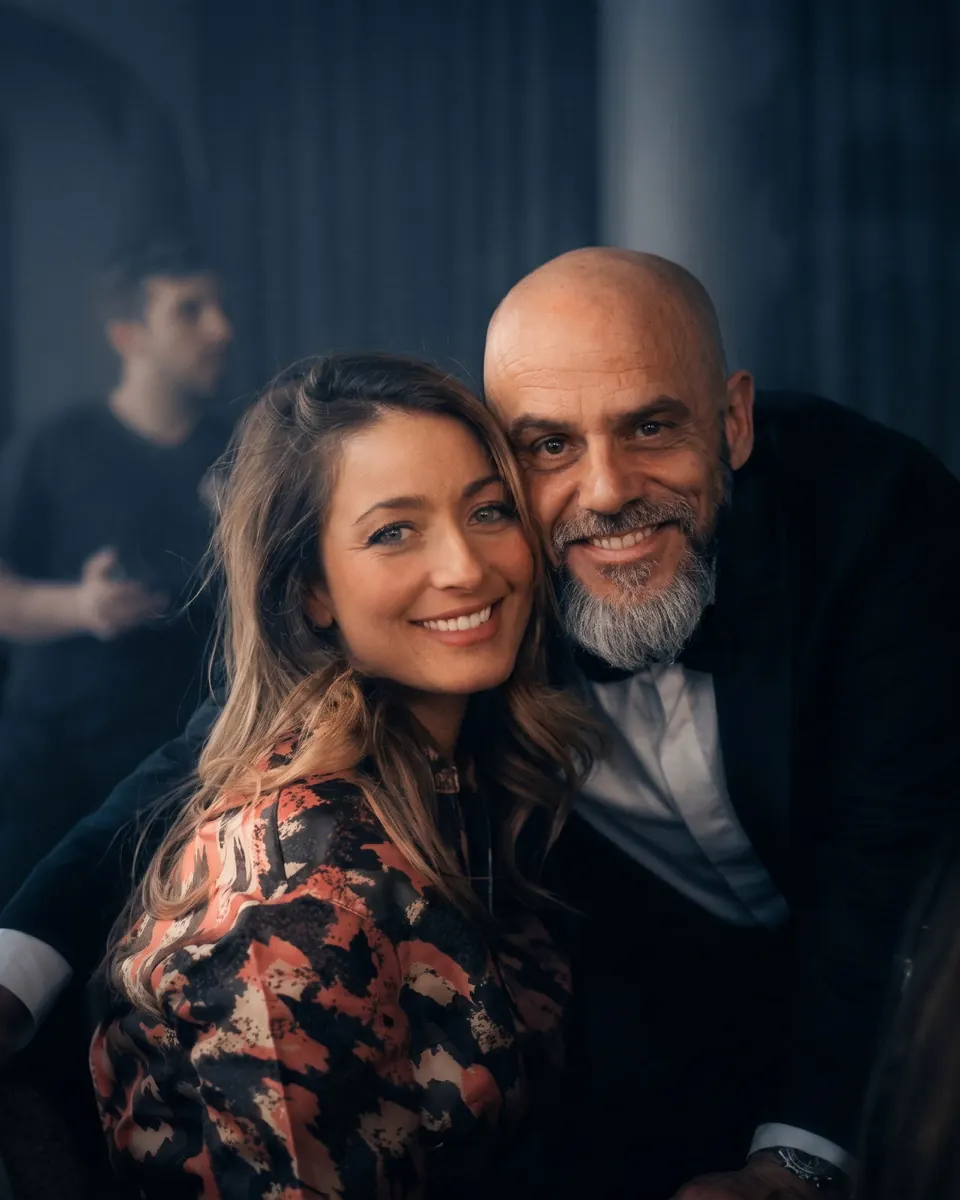 Portrait of Christophe Porquet and Jasmine Porquet together in a theatre.